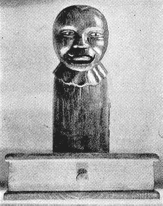 Wooden Two Faced Boy bank, front view